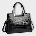 Erain - Sac en cuir de crocodile brillant