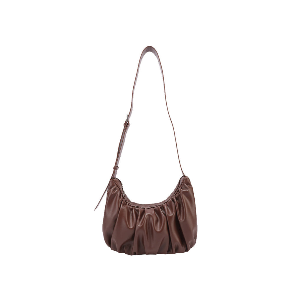 Chara | Sac banane en cuir en forme de croissant