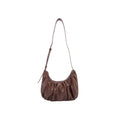 Chara | Sac banane en cuir en forme de croissant