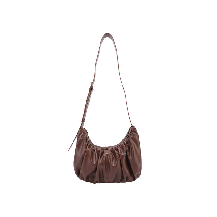 Chara | Sac banane en cuir en forme de croissant
