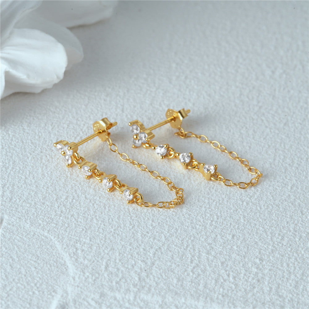 Puces d'oreilles Daniella en or à diamants