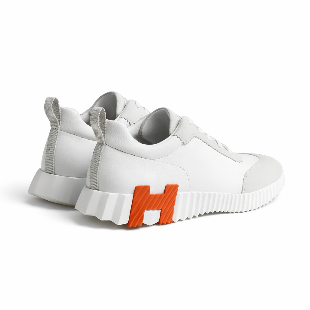 Hermès Bouncing Sneaker - White / Orange H Sole